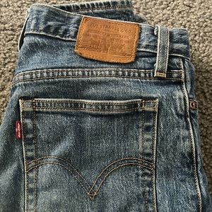 dark blue ripped levi jeans